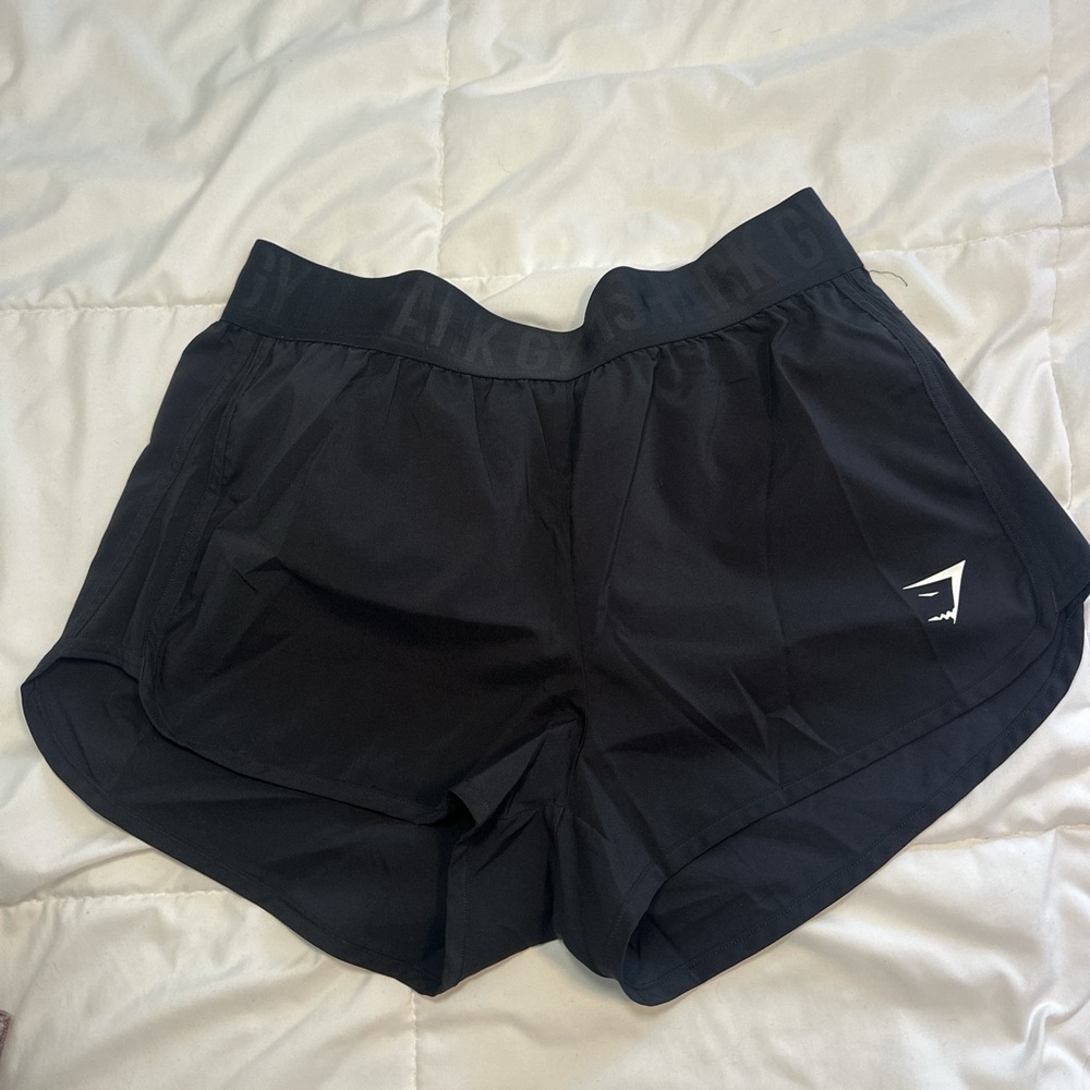 SOLD Gymshark Black Athletic Shorts with Moisture-Wicking Fabric and Relaxed Fit
